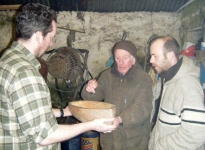 Loughie and Brian check the gouging of Stephen's hull.